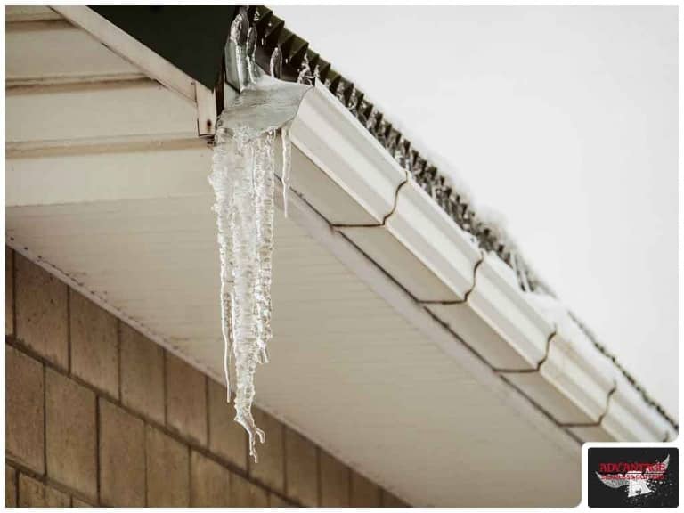 Why You Shouldn't Let Ice Hang Around on Your Roof and Gutters